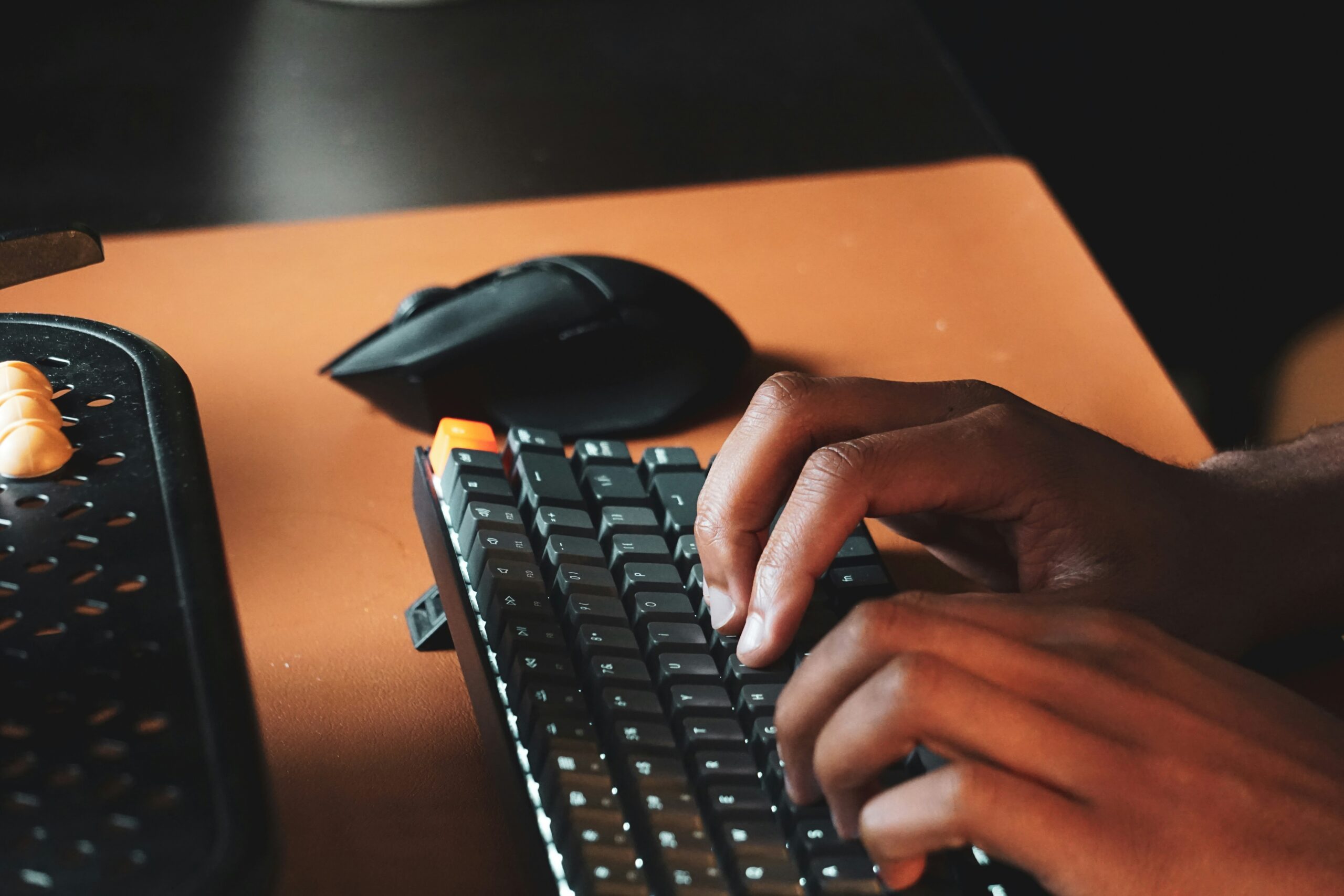 Person on keyboard typing.